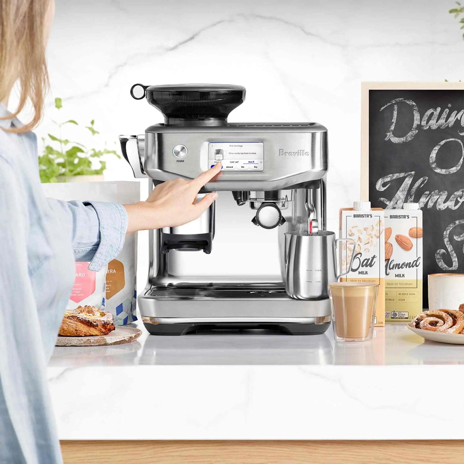 Breville Barista Touch Impress espresso machine with grinder and touchscreen display