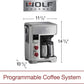 Wolf Gourmet Automatic Drip 10-Cup Coffee Maker with glass carafe and digital controls on a kitchen countertop.