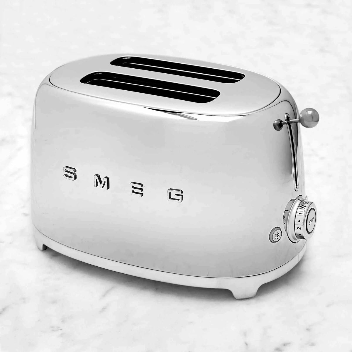 SMEG 2 Slice Toaster with retro '50s design, six browning levels, extra-wide slots, and chrome knob functions