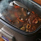 Cuisinart MSC-800 7-quart stainless steel multicooker with programmable slow cook, roast, sauté, and steam functions and blue backlit LCD display