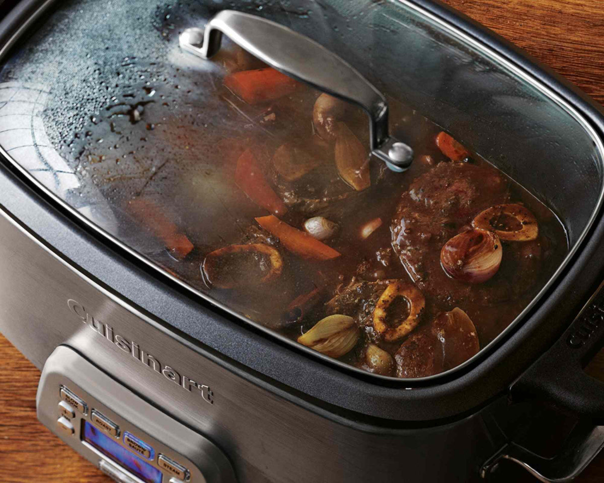Cuisinart MSC-800 7-quart stainless steel multicooker with programmable slow cook, roast, sauté, and steam functions and blue backlit LCD display