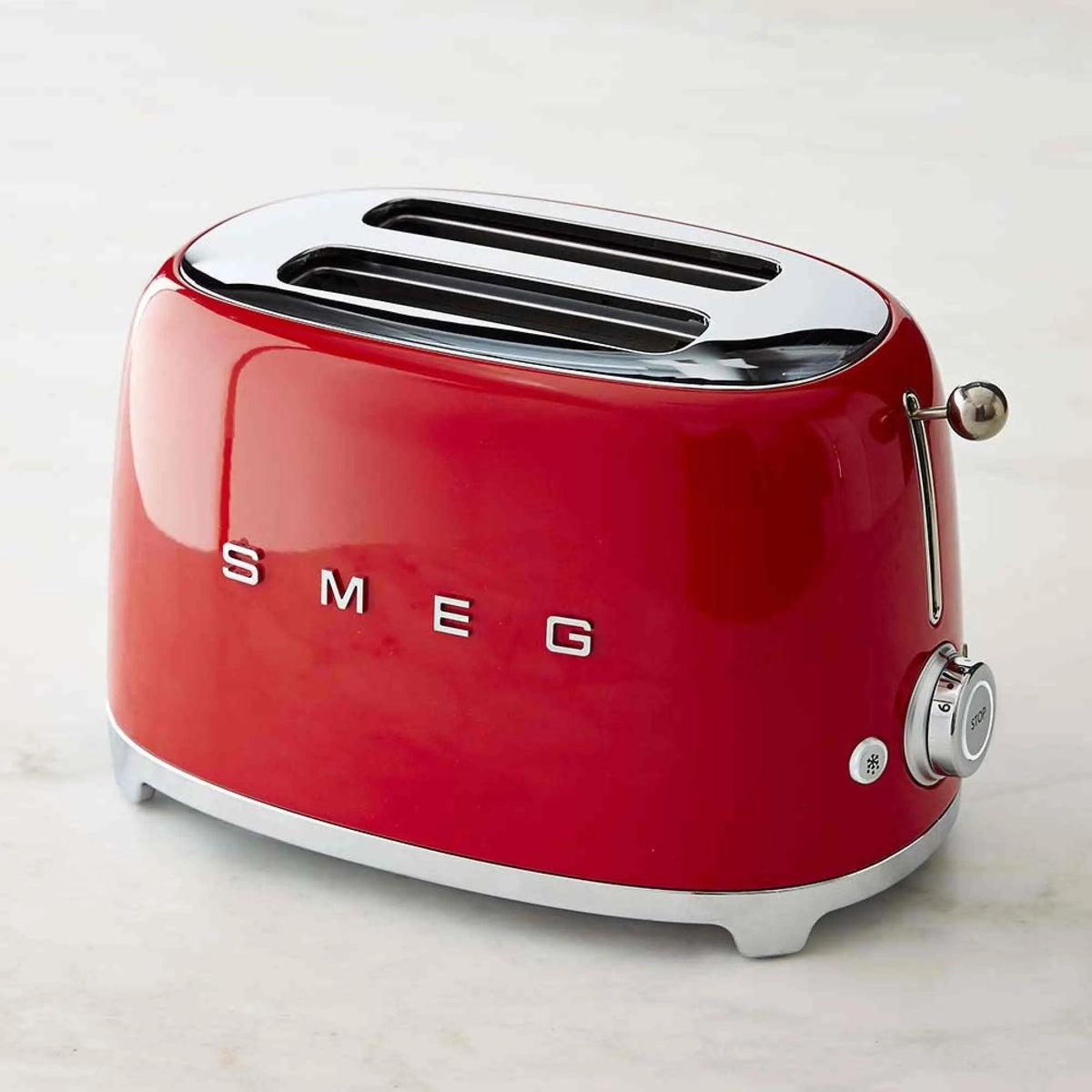 SMEG 2 Slice Retro Toaster in pastel color with extra-wide slots and chrome knob