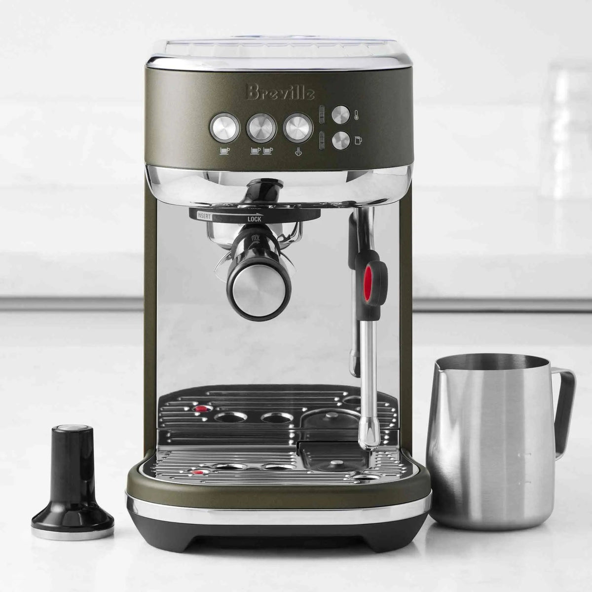 Breville Bambino Plus espresso machine in brushed stainless steel with compact design and automatic frothing features