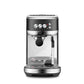 Breville Bambino Plus espresso machine in brushed stainless steel with compact design and automatic microfoam texturing