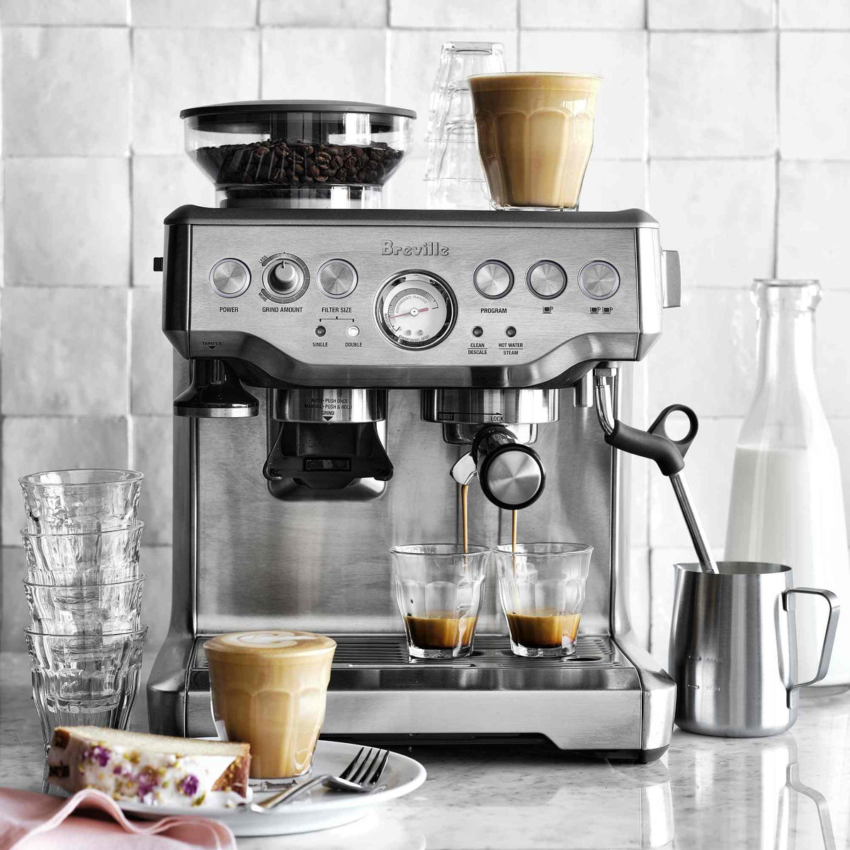 Breville Barista Express espresso machine in stainless steel with integrated grinder and steam wand for precise coffee brewing