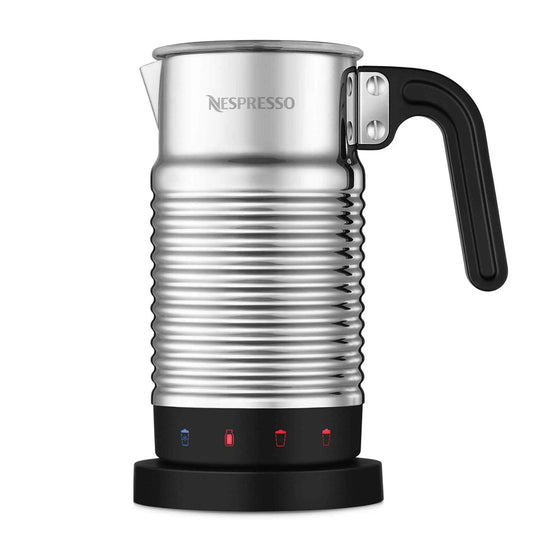 Nespresso Aeroccino 4 silver electric milk frother with ergonomic handle and chrome jug on kitchen counter