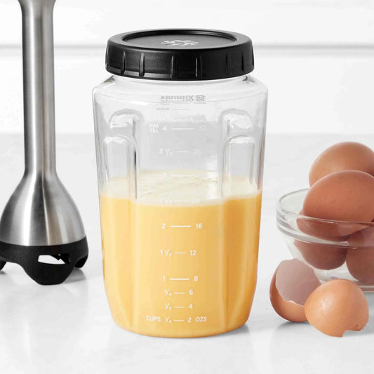 Vitamix Immersion Blender blending jar made of clear BPA-free Tritan with screw-on lid and measurement markings