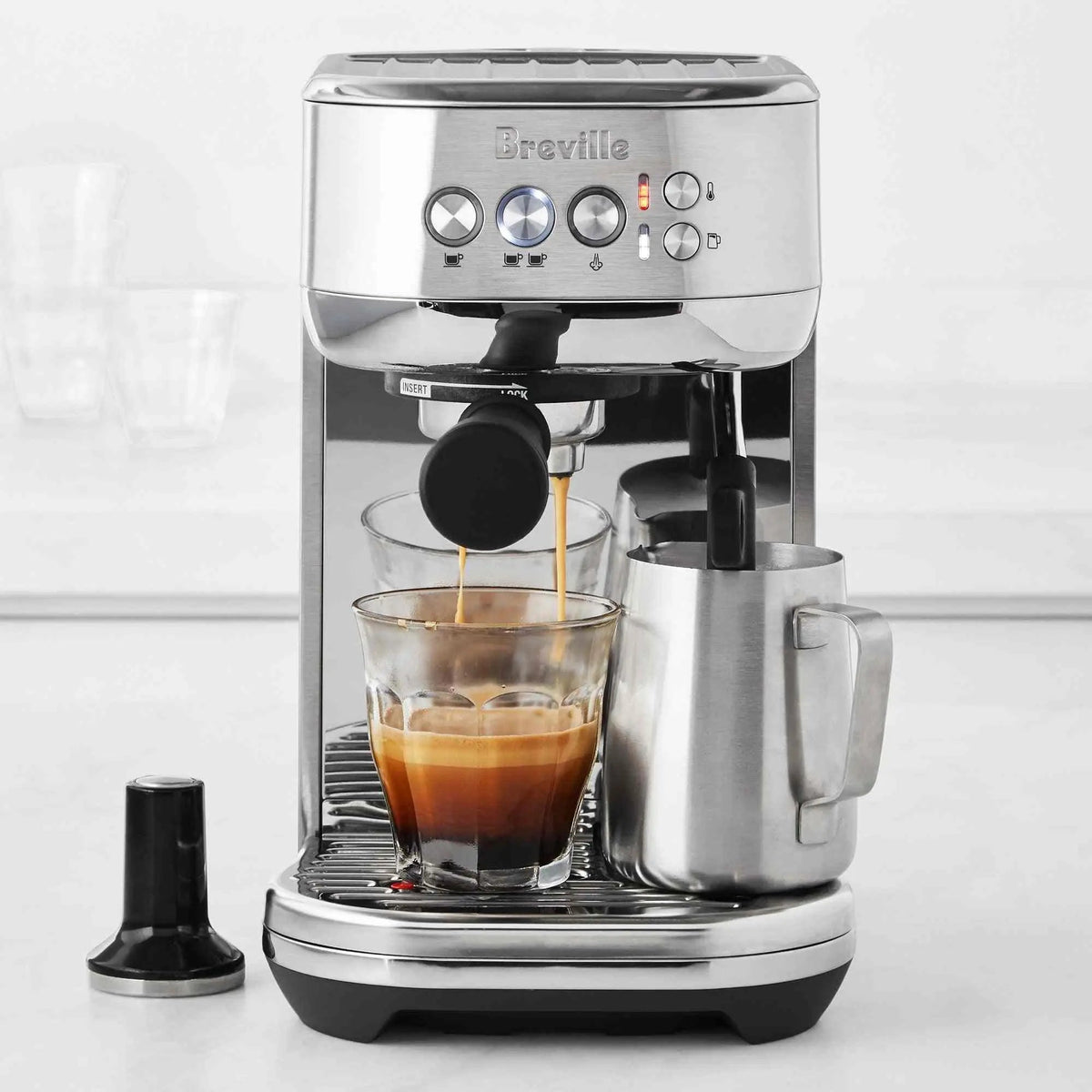 Breville Bambino Plus espresso machine in brushed stainless steel with automatic microfoam and compact design