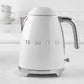 SMEG Electric Kettle with 360-degree swivel base, auto-shutoff, water-level indicators, gentle steam release, and removable limescale filter
