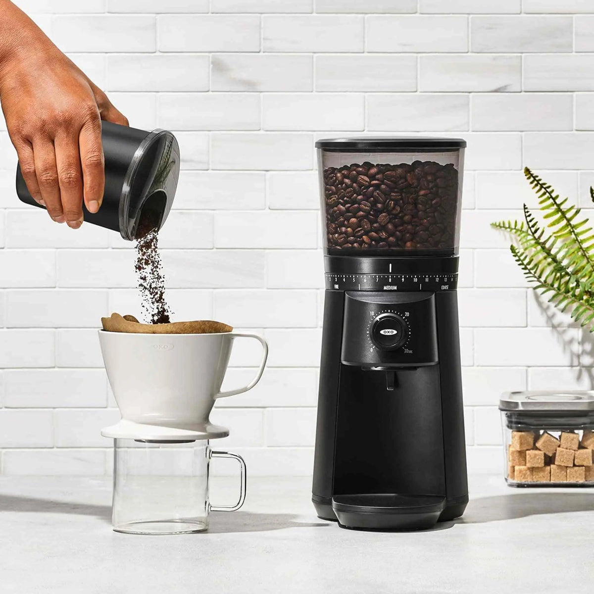 OXO Brew Conical Burr Coffee Grinder with stainless-steel burrs and 15 grind size settings for fresh coffee beans