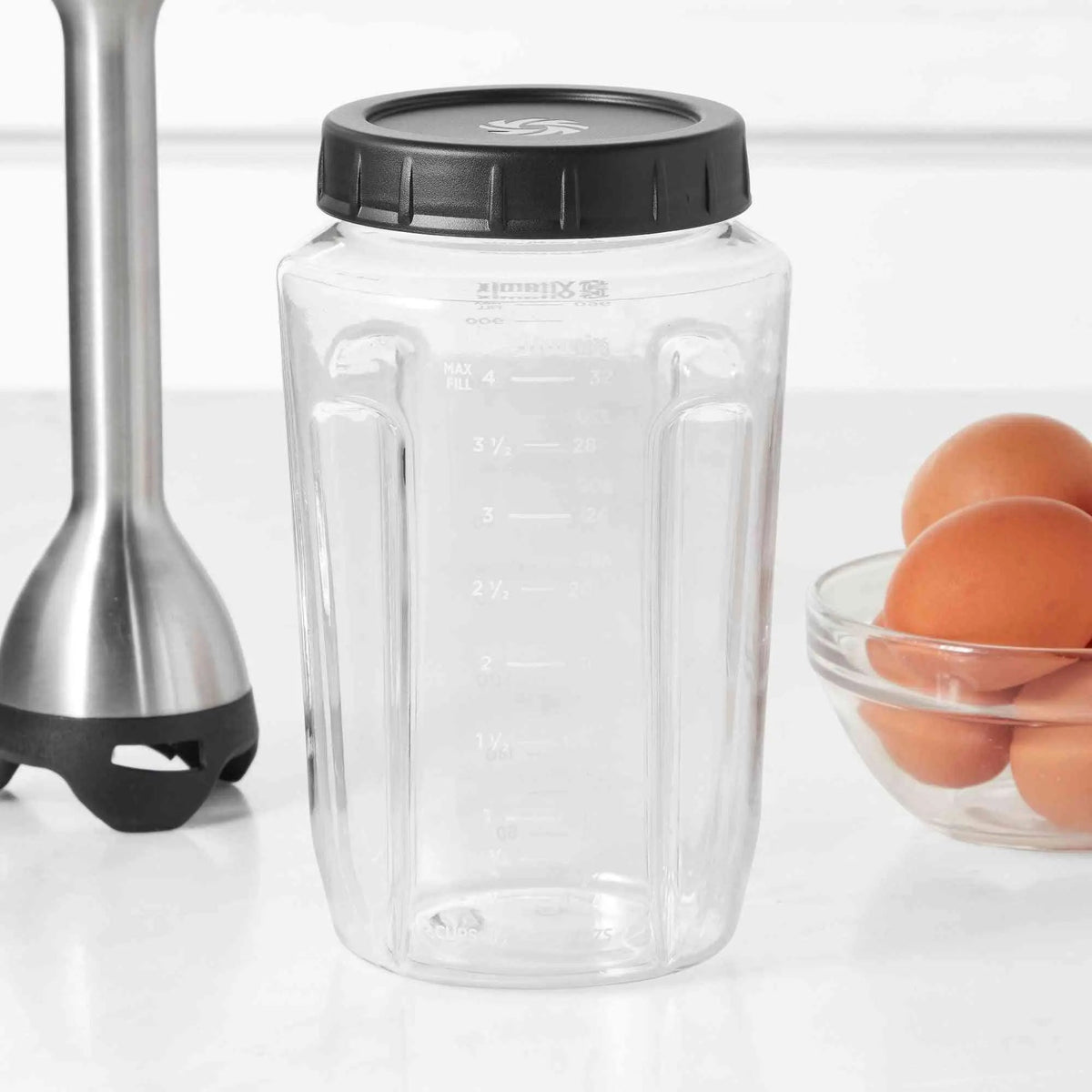 Vitamix Immersion Blender clear BPA-free blending jar with screw-on lid and measurement markings