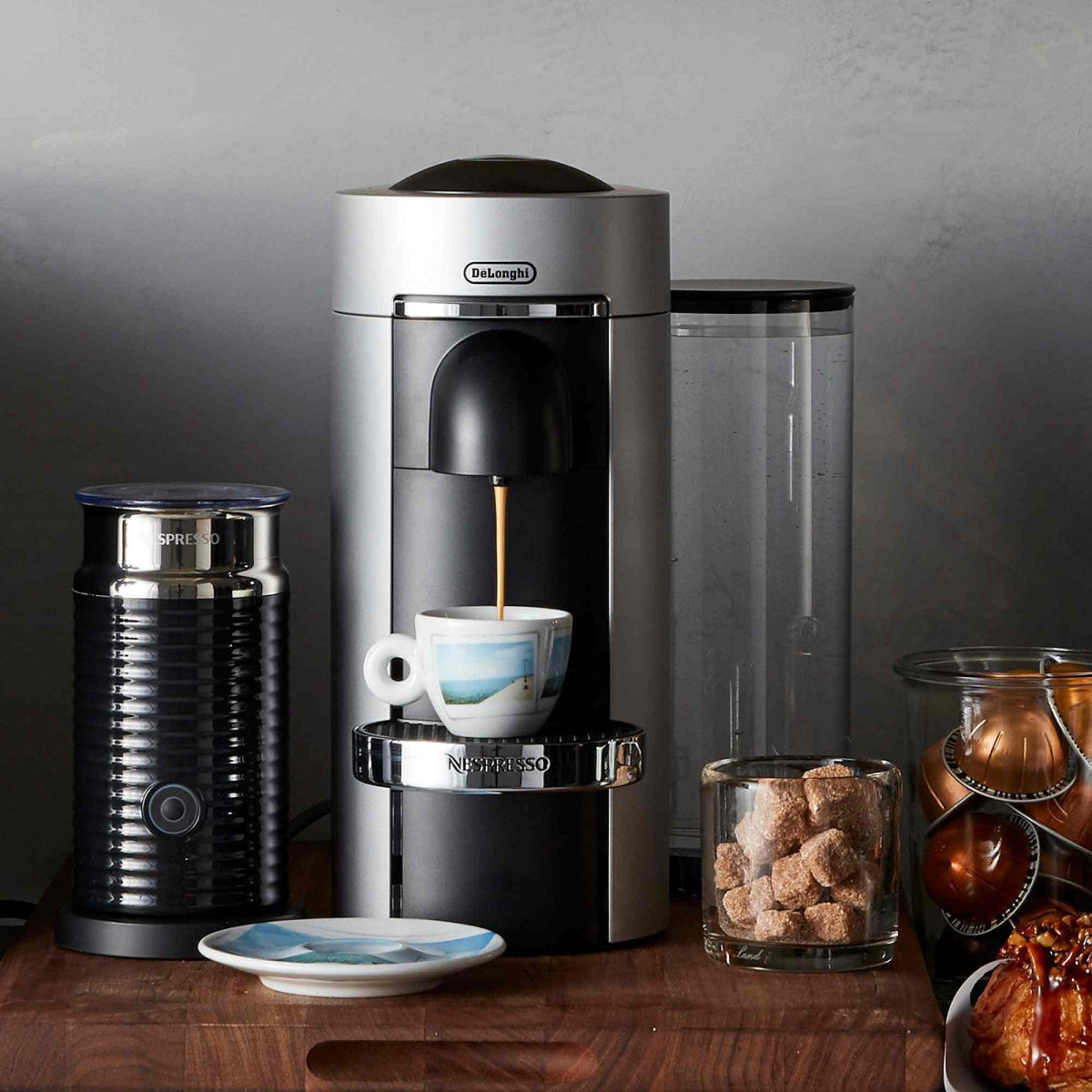 Nespresso VertuoPlus Deluxe Coffee Maker with Aeroccino Milk Frother in sleek chrome design