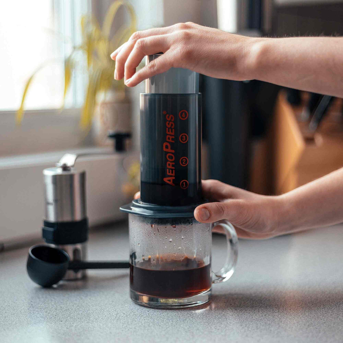 Aeropress Go Travel Coffee Press Kit with 3-in-1 brew technology for smooth, rich coffee on the go