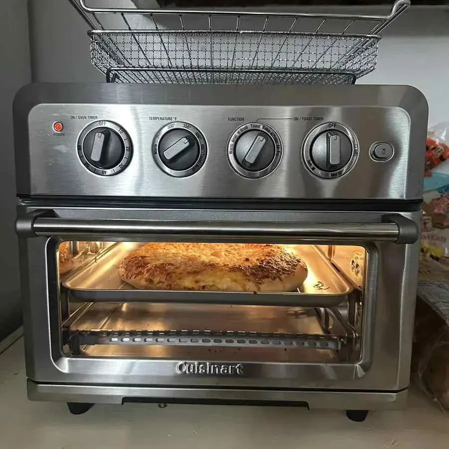 Cuisinart Air Fryer Toaster Oven 7-in-1 stainless steel countertop appliance with air fryer basket and adjustable temperature dial