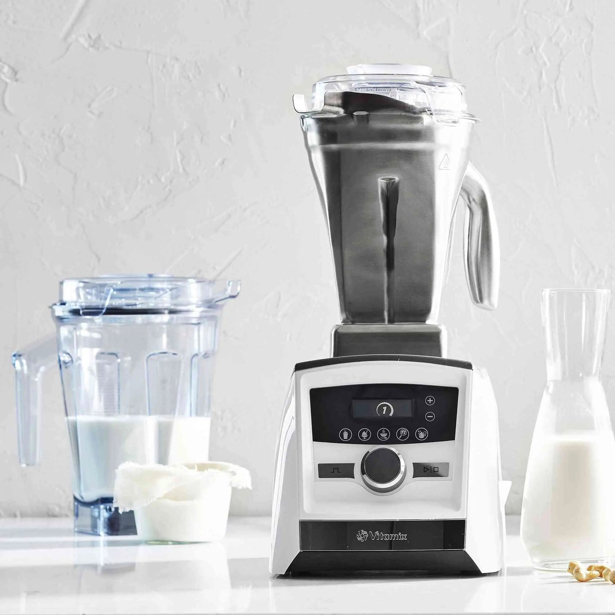 Vitamix Stainless Steel 48oz blender container with BPA-free clear lid and durable stainless steel blades