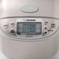 Zojirushi NS-TSC10 Micom rice cooker with fuzzy logic, multiple settings, steaming basket, and LCD display