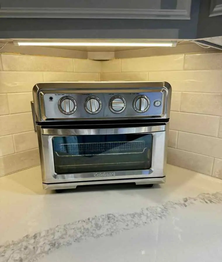 Cuisinart Air Fryer Toaster Oven 7-in-1 stainless steel kitchen appliance with air fryer basket and oven rack