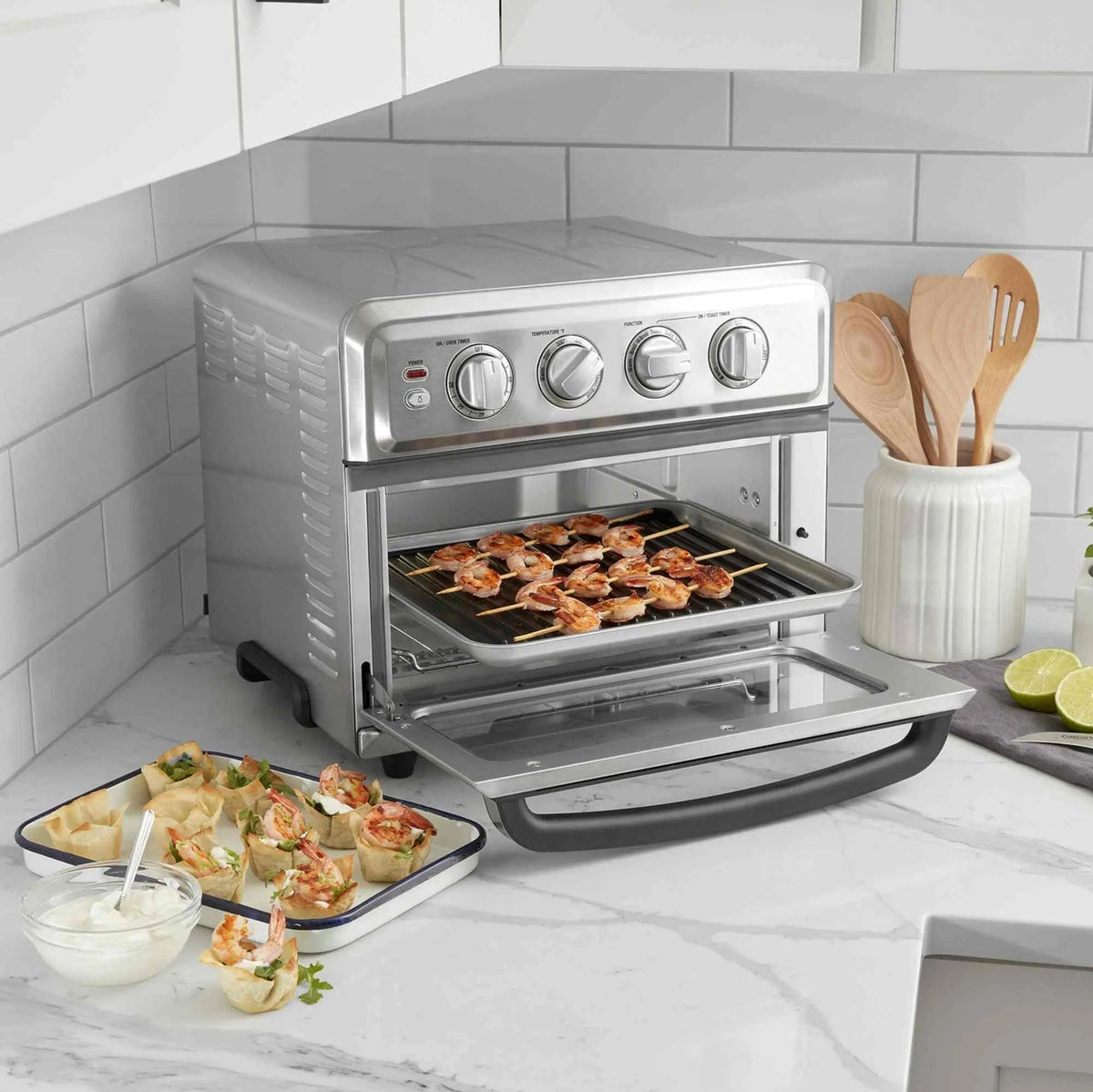 Cuisinart Air Fryer Toaster Oven 7-in-1 stainless steel kitchen appliance with air fryer basket and adjustable temperature dial